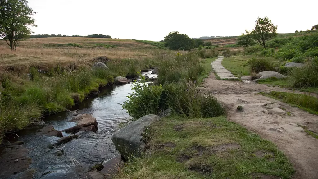 A footpath runs to the right of Burbage Brook